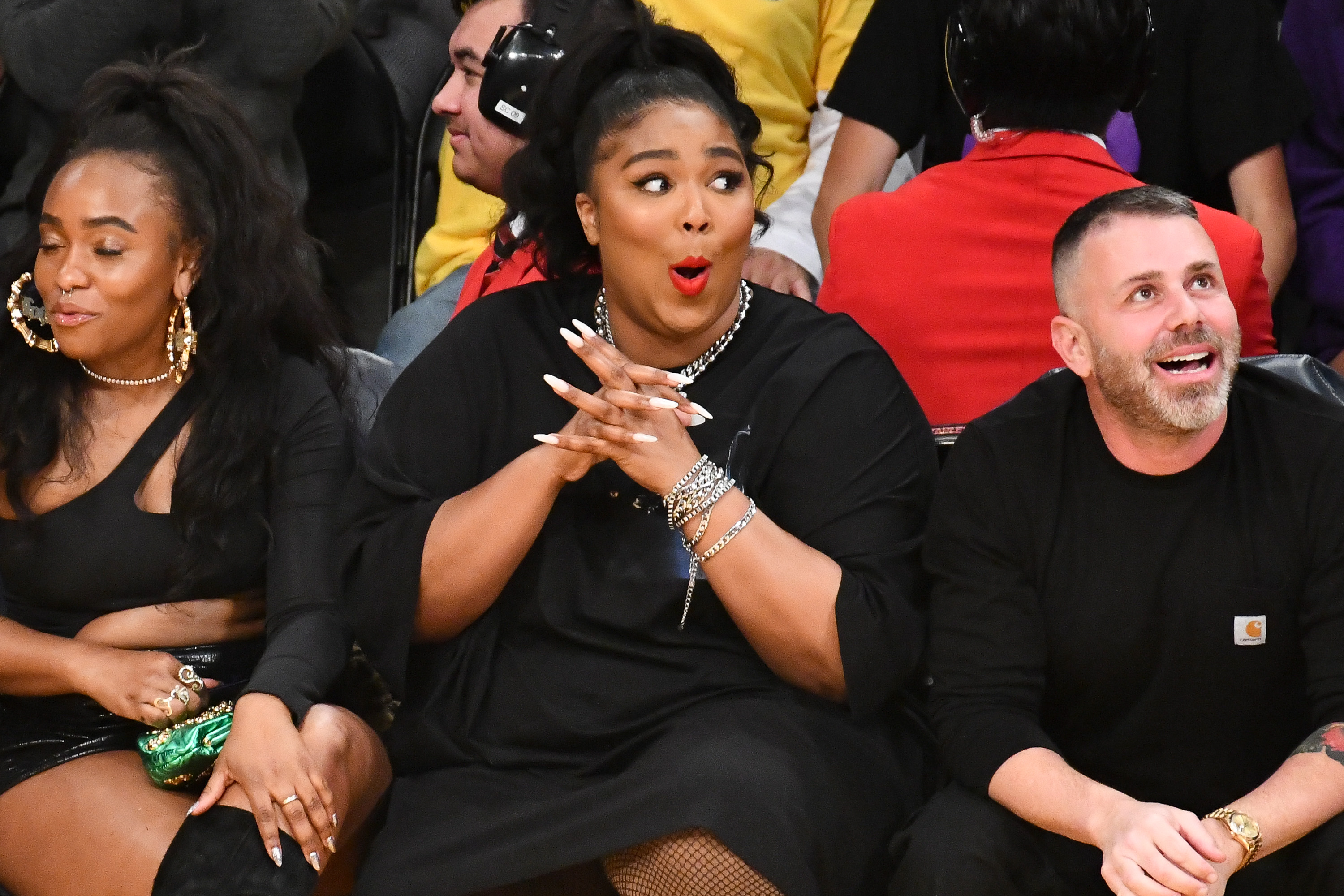 You Shouldn’t Be Body Shaming Lizzo For Her NBA Courtside Look