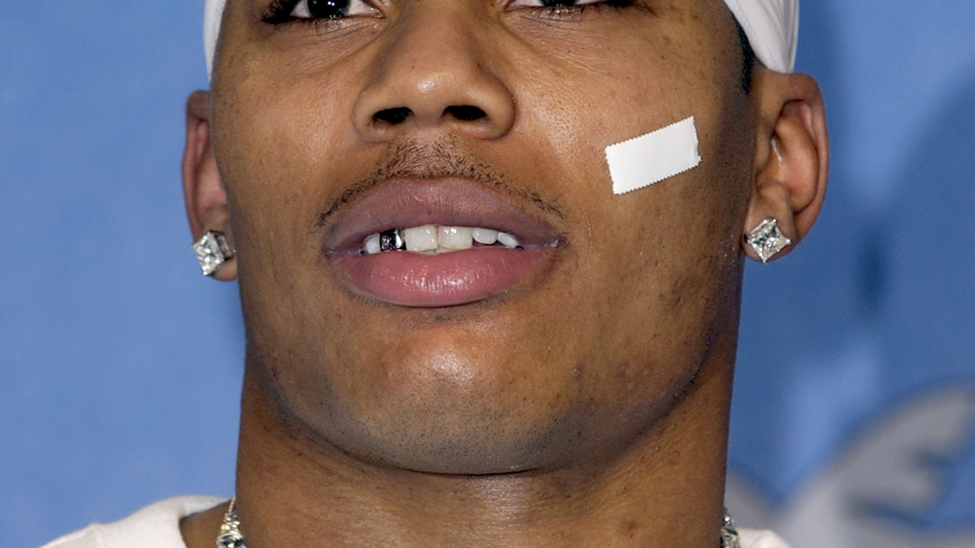 Nelly’s Flashiest Fashion Moments