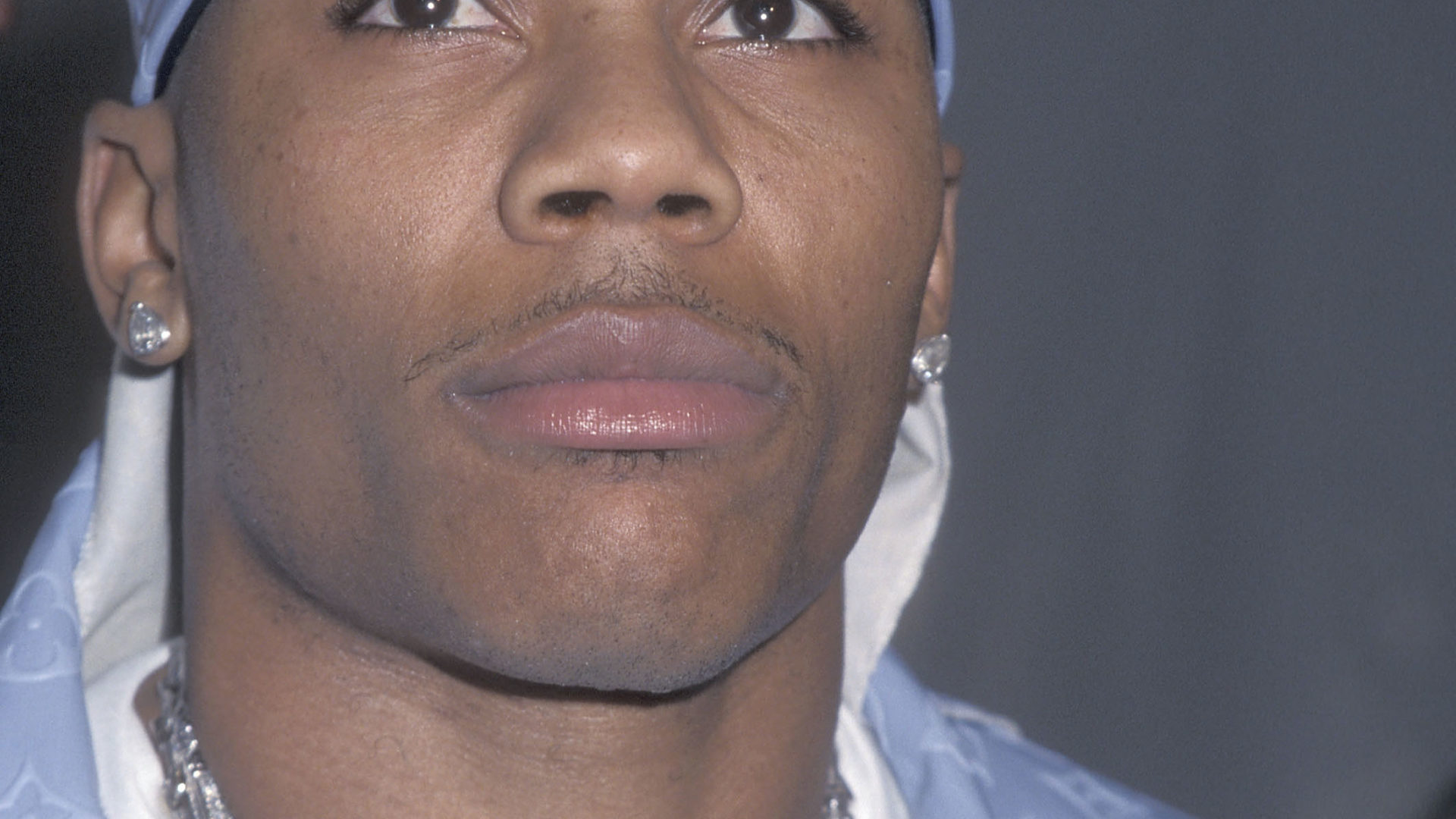 Nelly’s Flashiest Fashion Moments