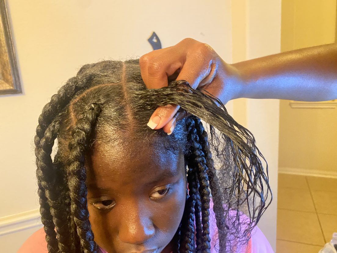 We Asked A Stylist To Break Down How To Achieve Knotless Braids