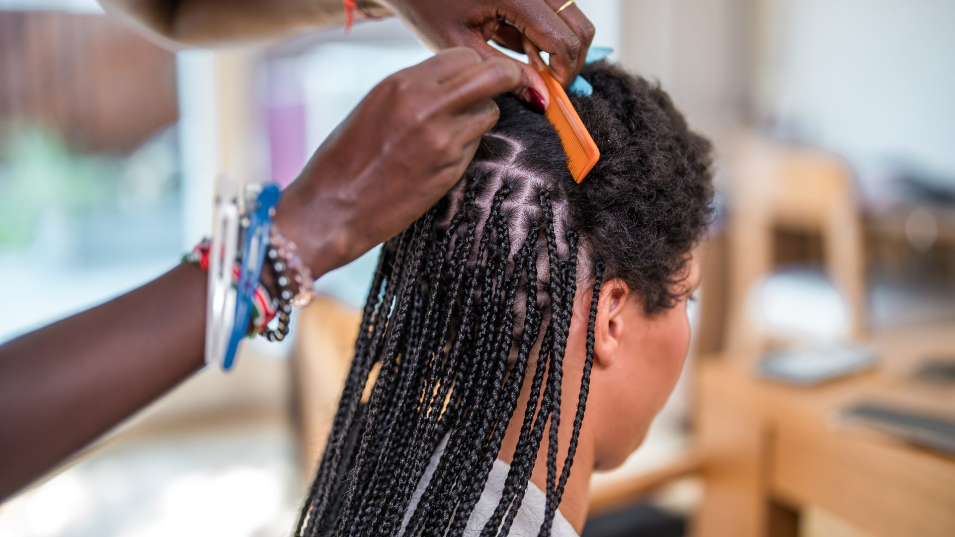 How To Protect Natural Hair This Summer, According To A Pro Stylist