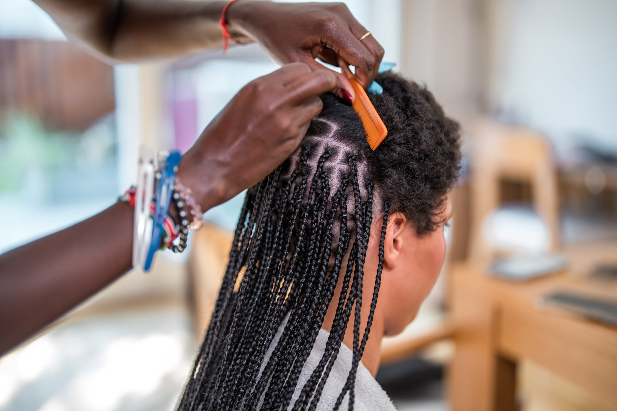 How To Protect Natural Hair This Summer, According To A Pro Stylist
